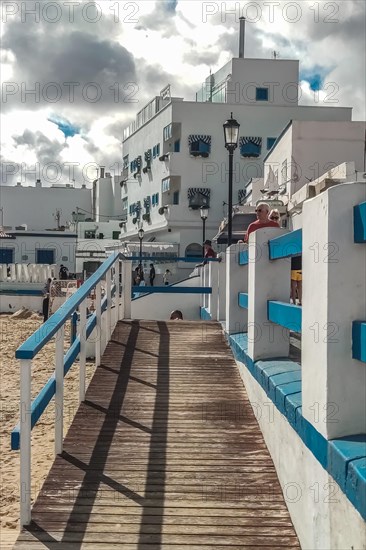 Typical white buildings and restaurants