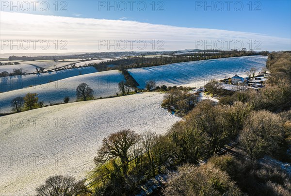 Fields and Farms shrouded in frost from a drone