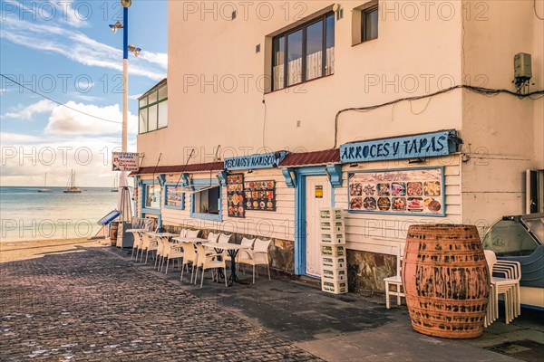 Typical white buildings and restaurants