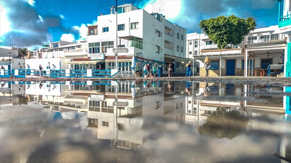 Typical white buildings and restaurants