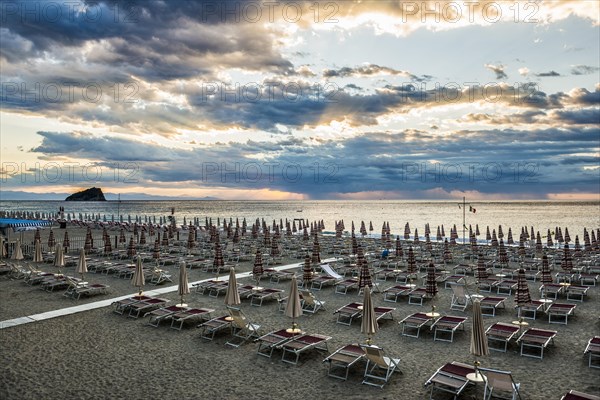 Empty beach and beach loungers