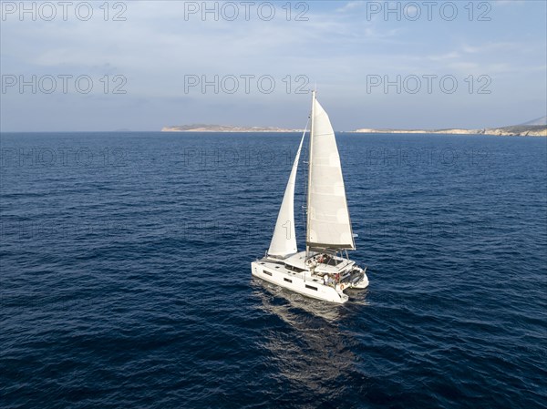 Sailing catamaran in full sail