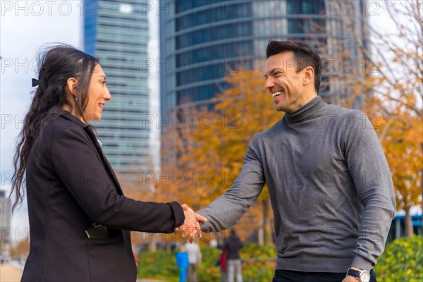 Multi-ethnic businessman and businesswoman