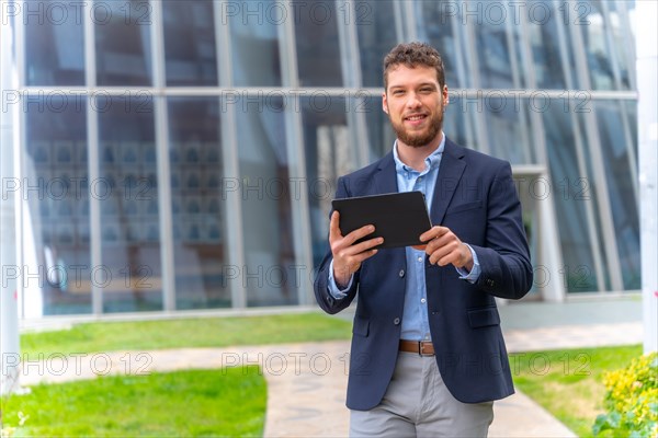 Young male businessman or entrepreneur outside the office