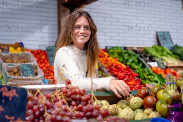 Woman worker of a greengrocer and vegetable food store. healthy and healthy life