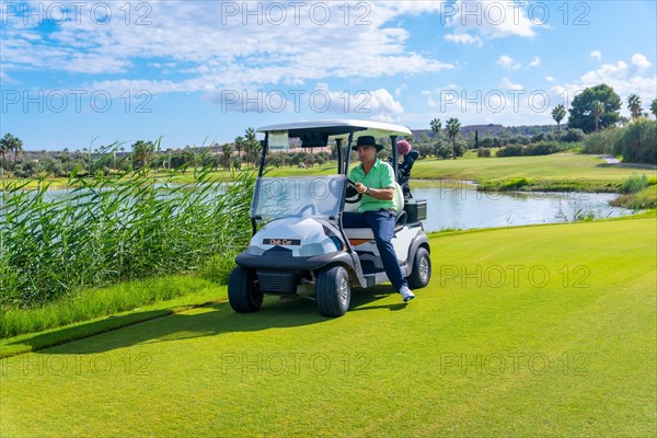 Man playing golf