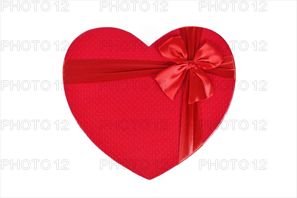 Top view of red heart shaped Valentine's day gift box on white background