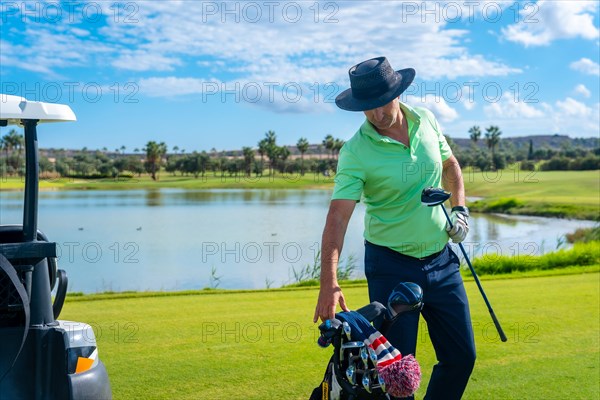 Man playing golf