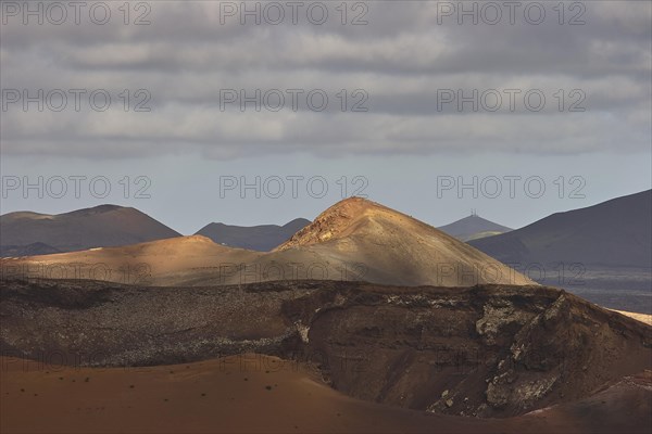 Different coloured lava hills