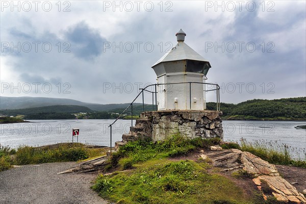 Small white lighthouse at the tidal stream Saltstraumen