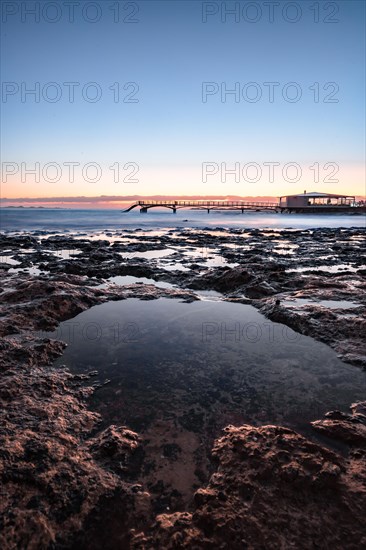 Long exposure at sunrise at the coast near Corralejo