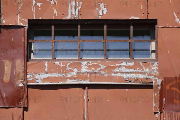 Old window on a harbour shed