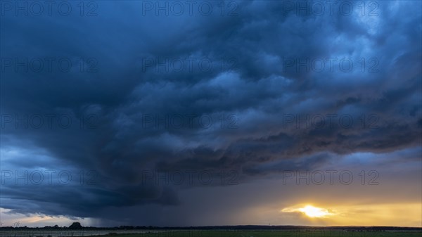 Stormy clouds at Lake Duemmer at sunset