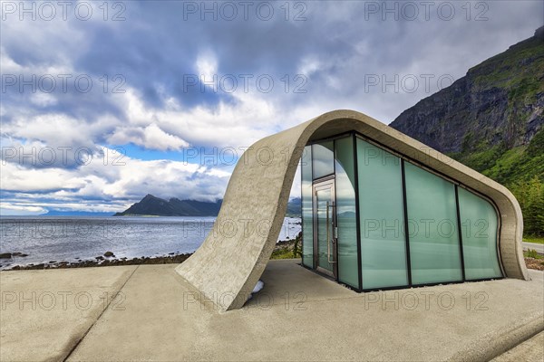 Ureddplassen rest area with wave-shaped concrete and glass toilet block