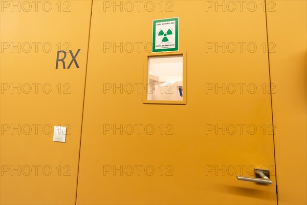 Corridor of a dental clinic with multiple boxes and the x-ray room