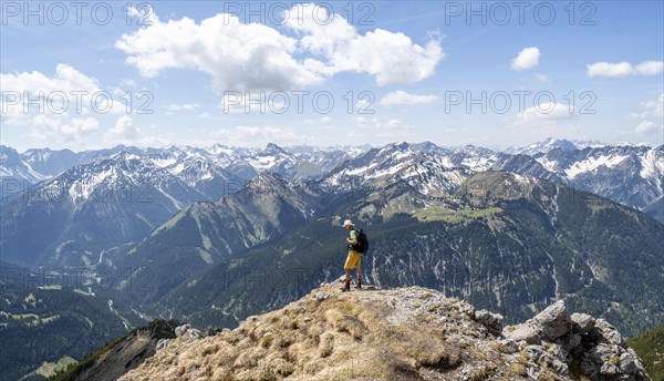 Hiker at the summit of Thaneller