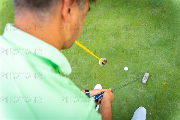 Man playing golf