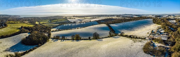 Panorama of Fields and Farms shrouded in frost from a drone