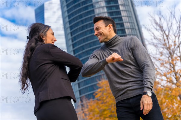 Multi-ethnic businessman and businesswoman