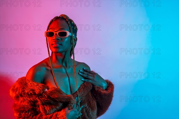 Black ethnic woman with braids with red and blue led lights
