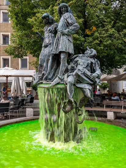 The wedding fountain with green water on the Amberg market square