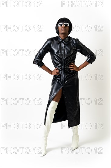 Black ethnic man in studio with white background