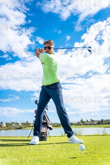 A player playing golf on a golf course