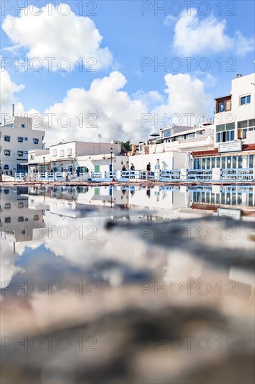 Typical white buildings and restaurants