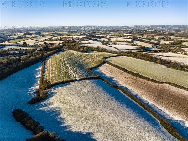 Fields and Farms shrouded in frost from a drone