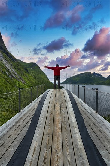 Tourist standing on viewing platform Bergsbotn