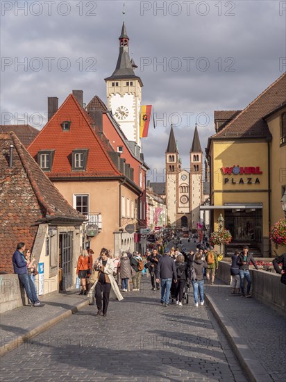 View from the Old Main Bridge towards the Grafeneckart Tower and the Romanesque-style Wuerzburg Cathedral on Domstrasse