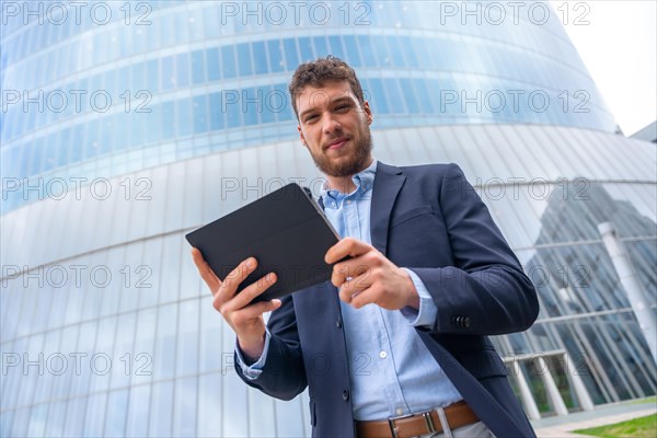 Portrait male businessman or entrepreneur outside the office