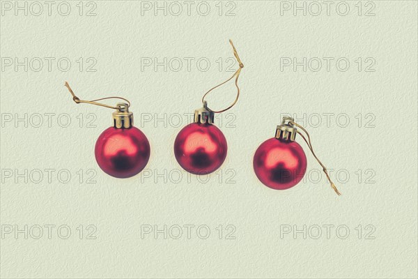 Concept of the postcard with Christmas baubles covered with snow