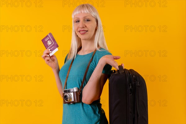 Portrait of tourist with suitcase