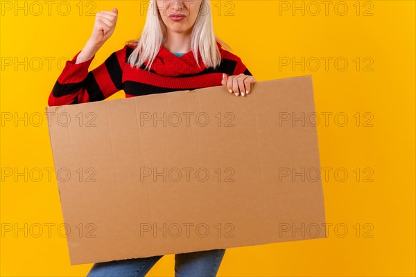 Demonstrating with empty cardboard advertisement poster