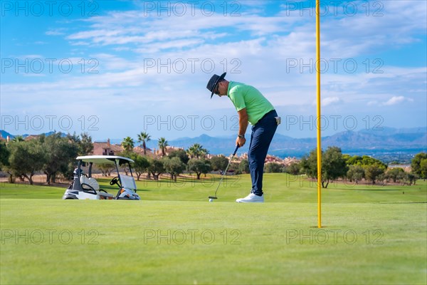 Man playing golf