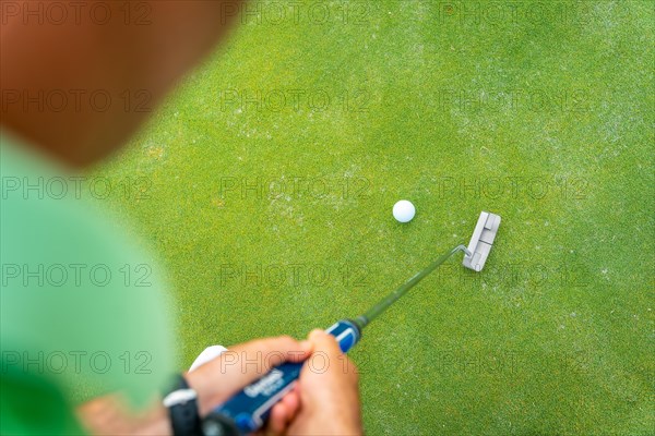 Man playing golf