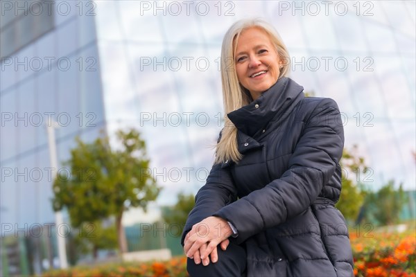 Corporate portrait of middle-aged businesswoman