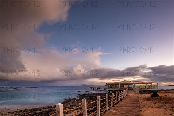 Long exposure at sunrise on the coast near Corralejo