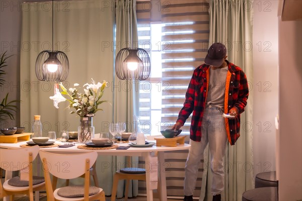 Black ethnic man shopping in a furniture store