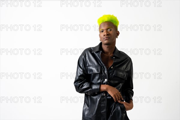 Black ethnicity man in studio with white background