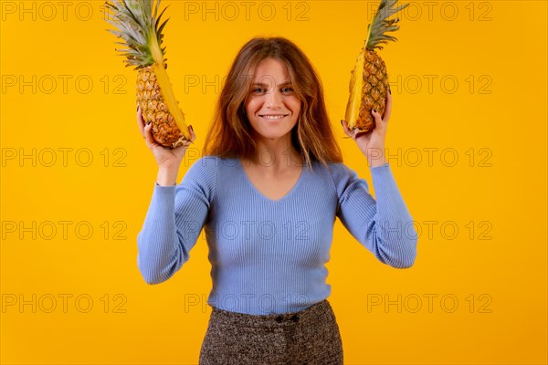 Woman with a pineapple in sunglasses
