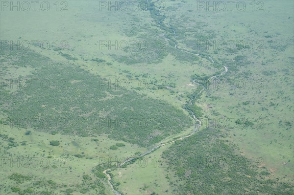 Savannah landscape with river from the plane