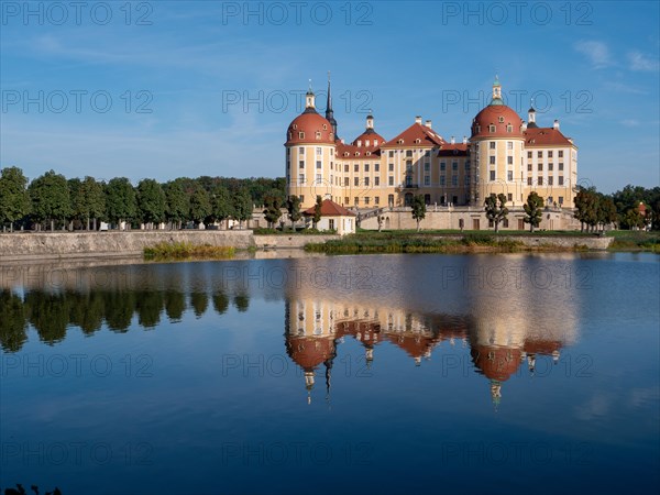 Hunting and baroque castle Moritzburg in the middle of castle pond lake