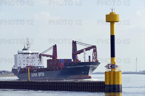 General cargo vessel Sloman Discoverer on the Weser near Bremen Vegesack