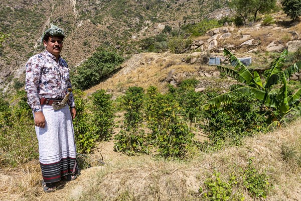 Traditional dressed man of the Qahtani Flower men tribe in the coffee plants