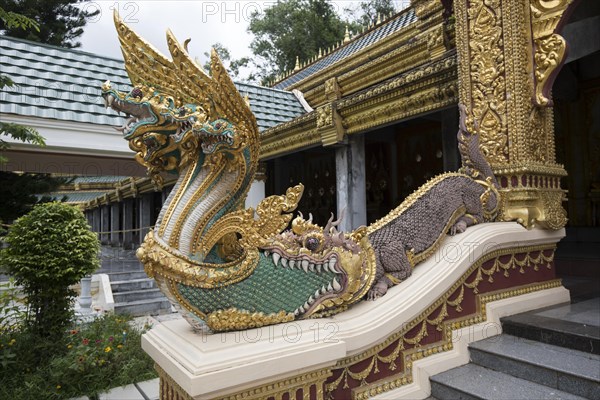 Dragon heads at the entrance of the temple complex Sri Chai Mongkol Grand Pagoda