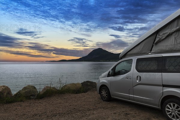 Campervan on car park by the sea