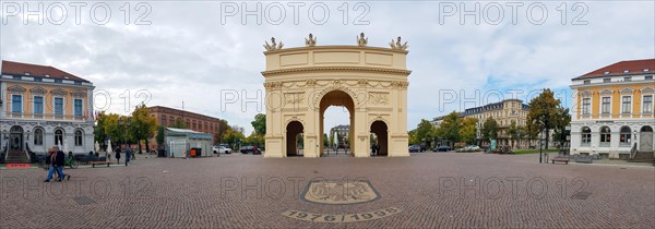 Panoramic photo of the classicist triumphal arch Brandenburg Gate at Luisenplatz