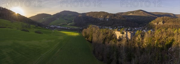 Ruined castle at sunset in the valley of the Birs